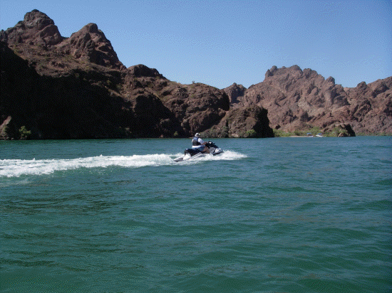 Katie zoooming up the river