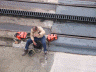 Worker below the ship
