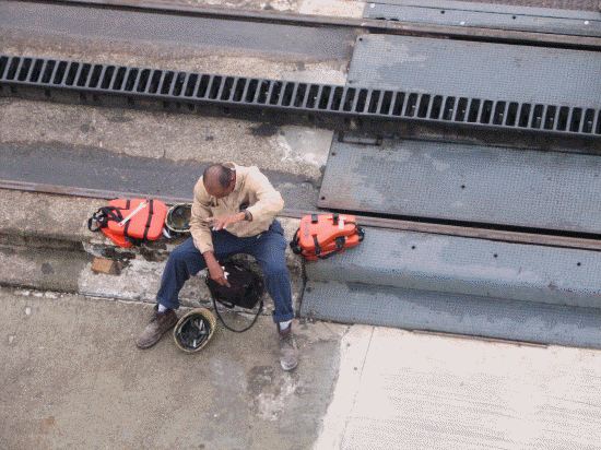 Worker below the ship